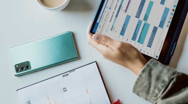 Investor reviewing a portfolio – using the CGT annual allowance in 2026