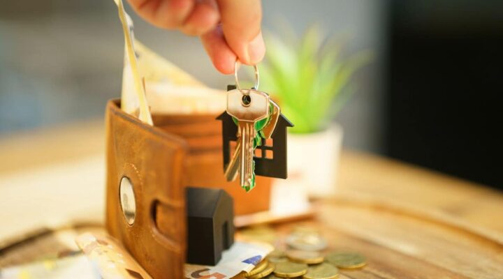 House keys held in hand – giving an inherited property away and CGT