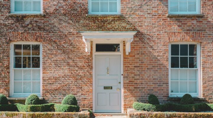 Brick family home with white door – CGT on a property inherited from a parent