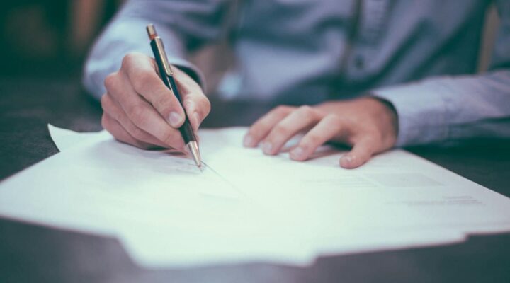 Trustee reviewing documents – CGT on a property left in trust